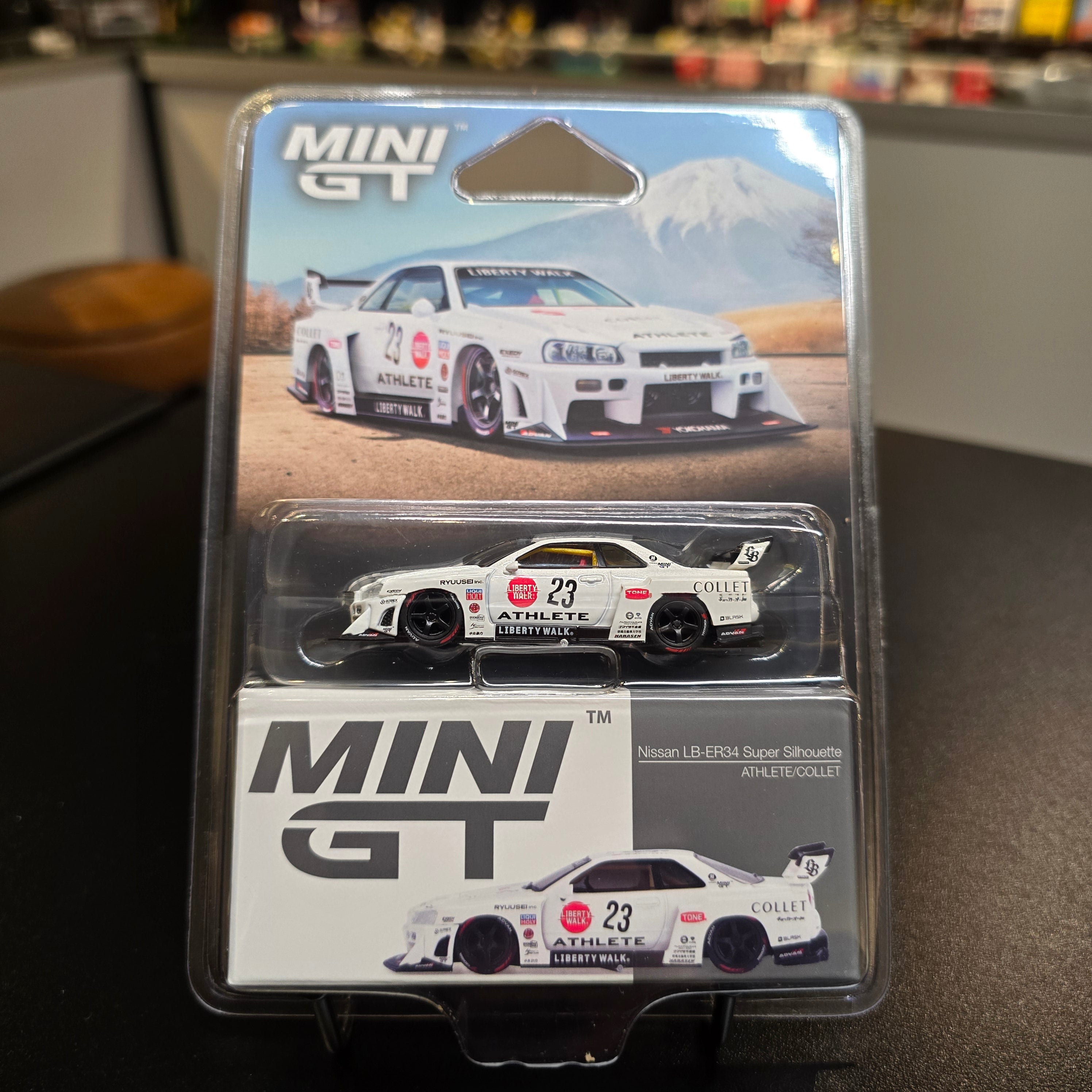 Mini GT 1:64 Nissan LB-ER34 Super Silhouette ATHLETE/COLLET – White
