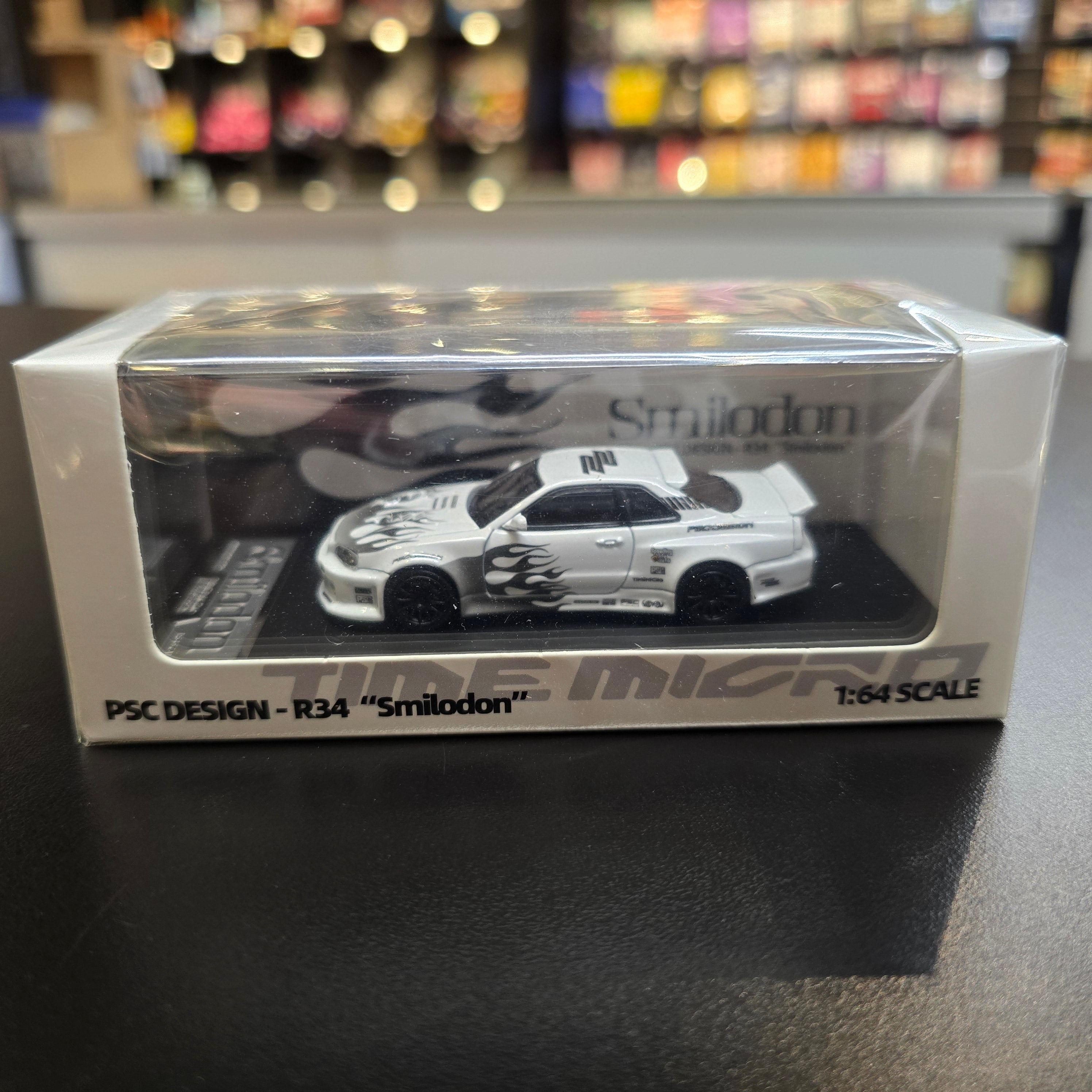TimeMicro × PSC DESIGN
1:64 R34 "Smilodon" Black & White Diecast Car Model
