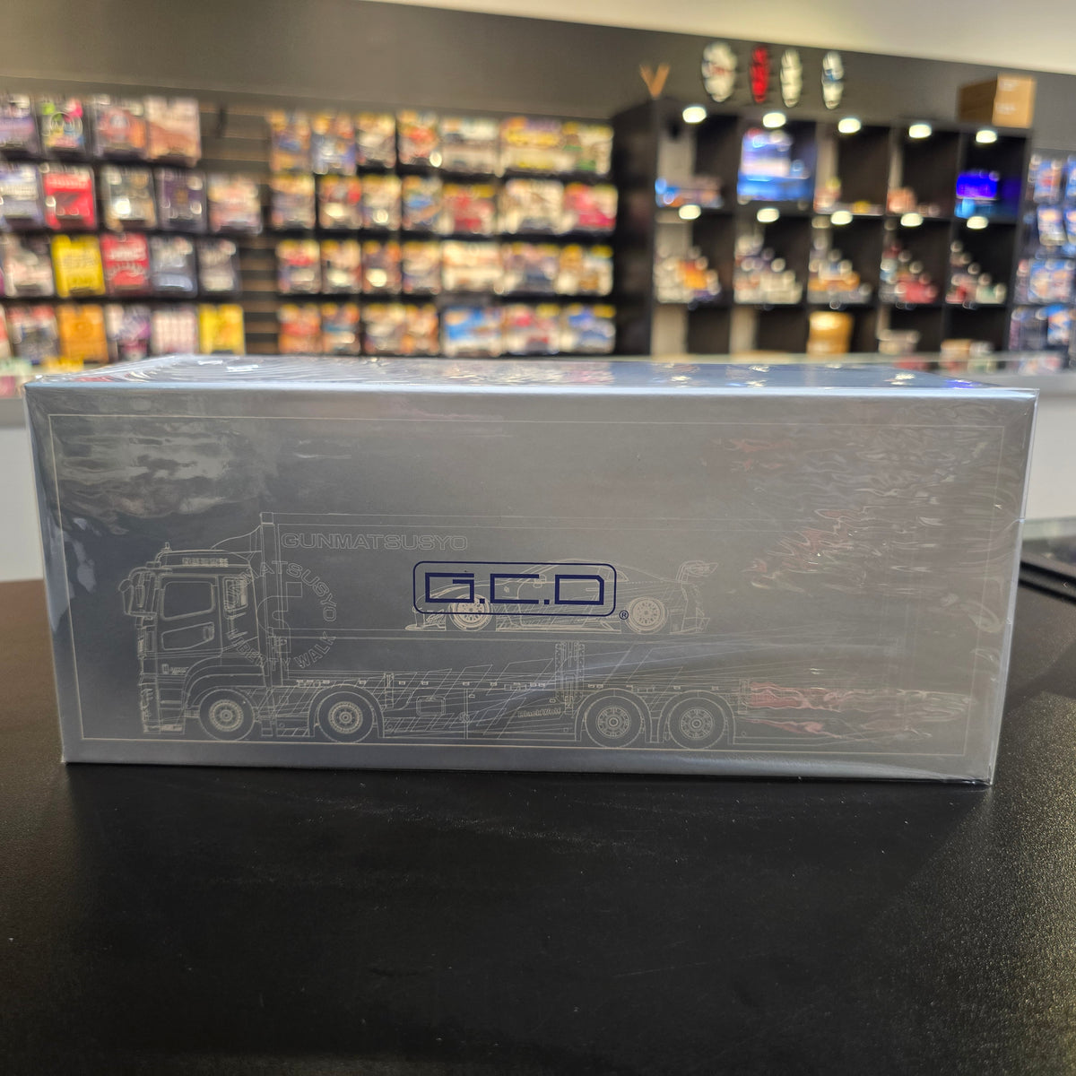 GCD 1:64 LBWK Mitsubishi Fuso Super Great Transporter TAS Special – Silver- Special Edition