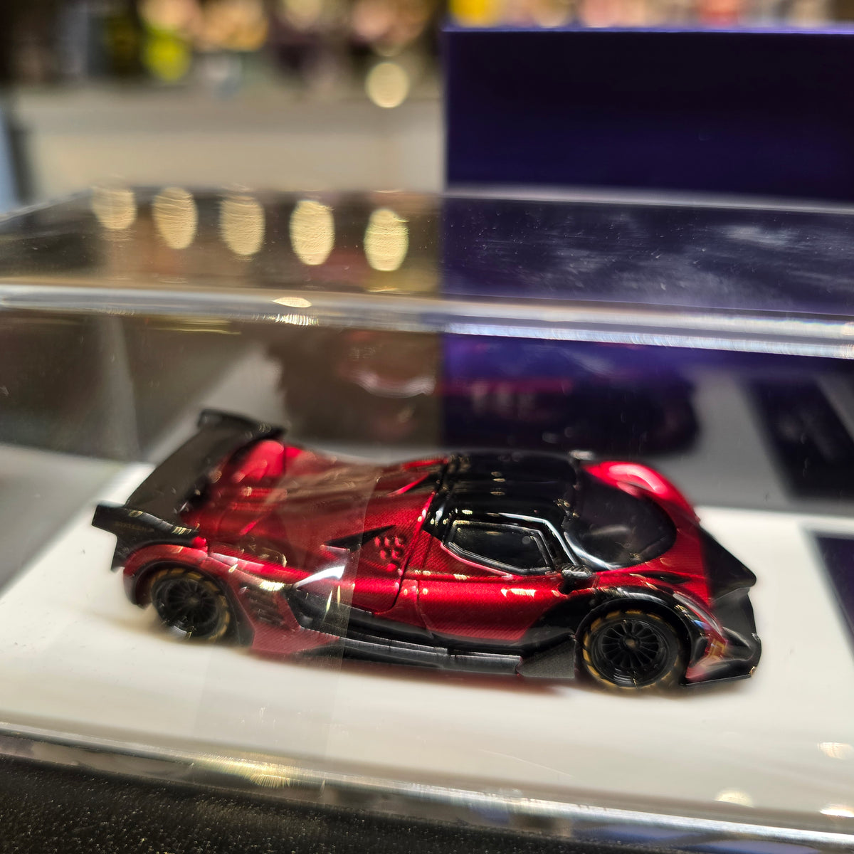 LMF 1:64 Devel Sixteen Diecast Model Carbon Red with Rear Wing