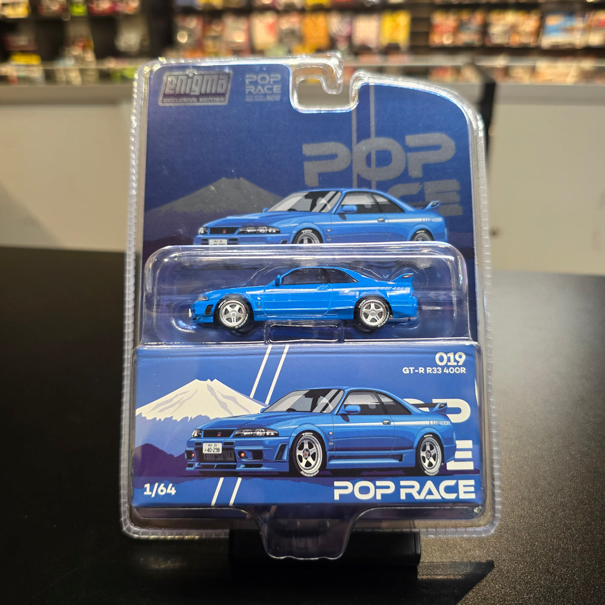 POP RACE 1/64 SKYLINE GT-R R33
NISMO 400R CHAMPIONSHIP BLUE (enigma
exclusive edition) PRE019