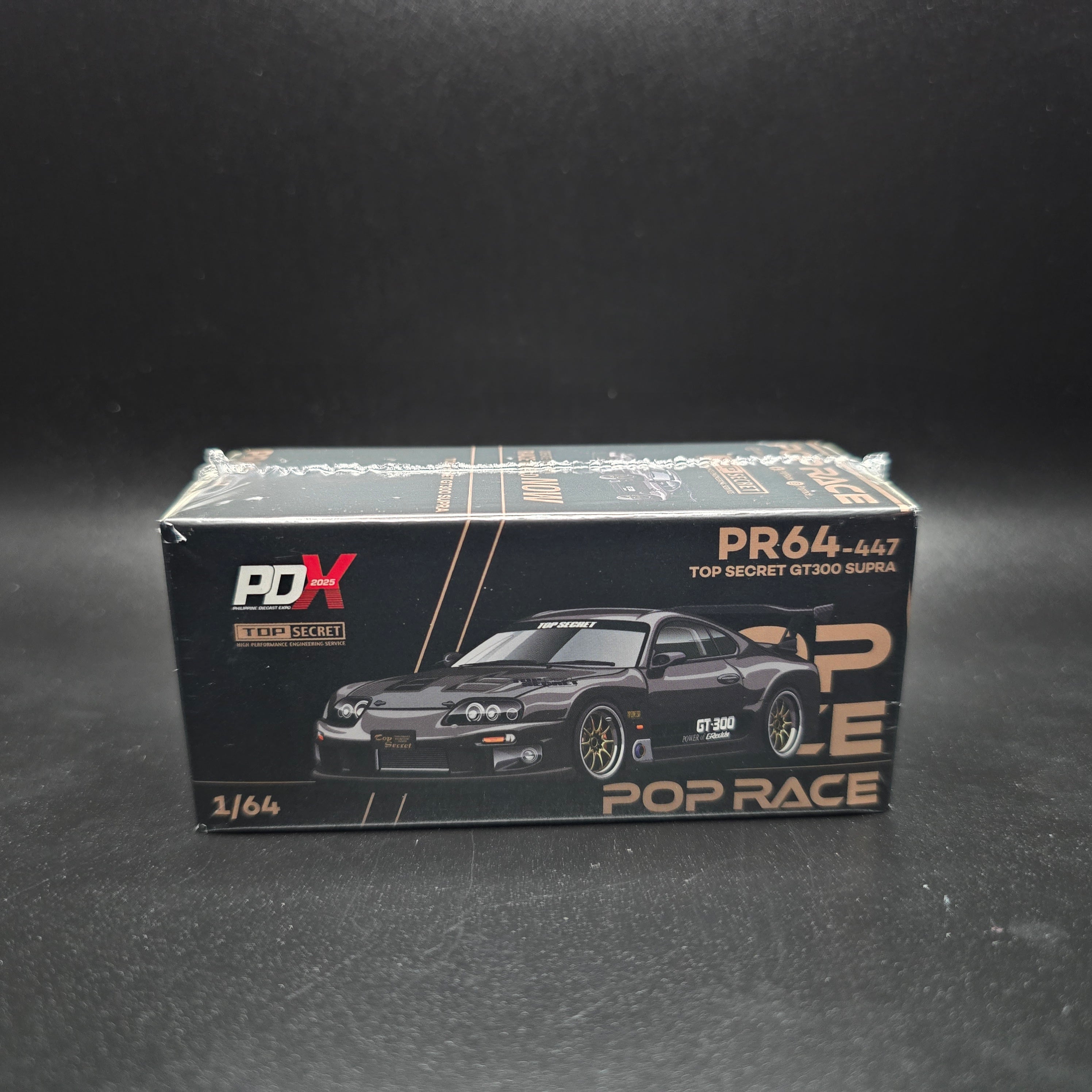 Poprace 1/64 Toyota Supra Top Secret GT300 Gray Gold PDX 2025 Diecast