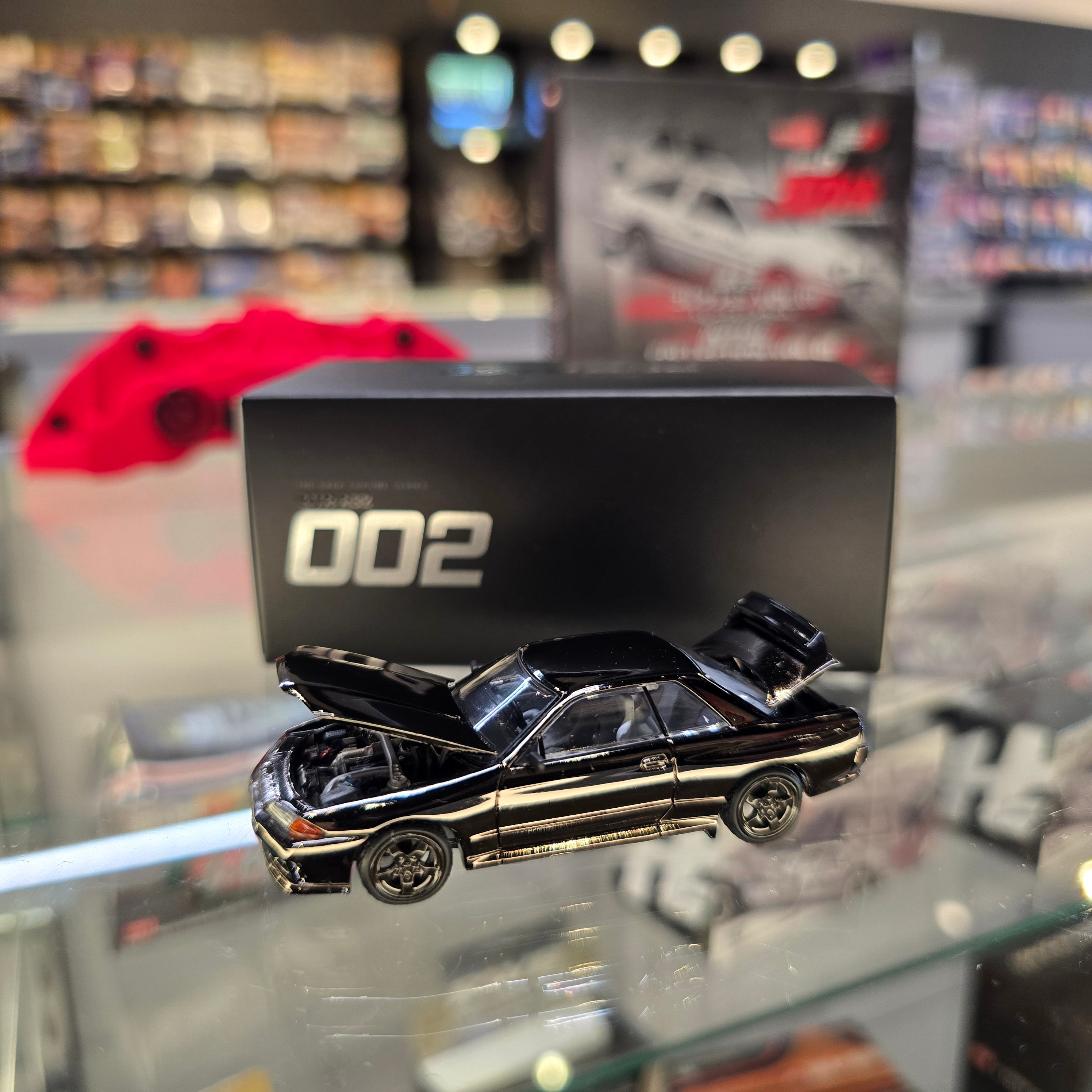 POP RACE 1/64 R32 GT-R DARK CHROME PRDC002