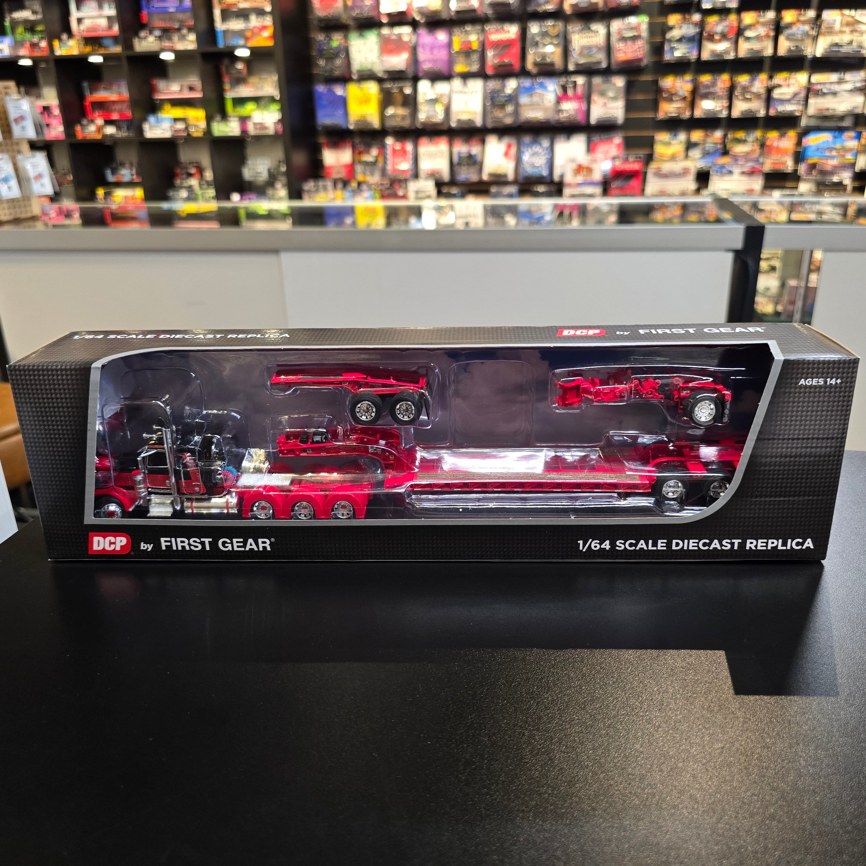 DCP 60-2133 1:64 Peterbilt 389 36" Flat Top Sleeper w/Fontaine Lowboy Trailer & Booster (Black/Red)